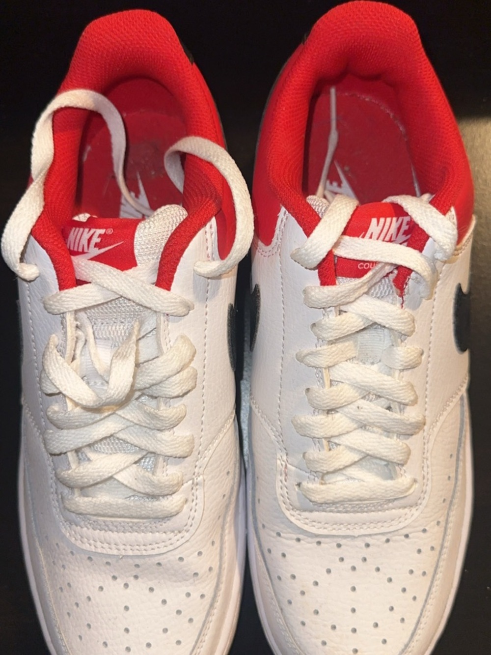 Nike White Shoe with Red Interior and Black Swoosh Detail
